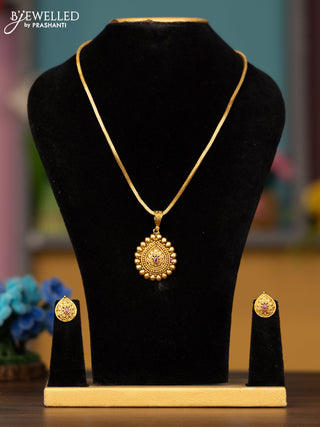 Antique chain with floral design pendant in kemp stones