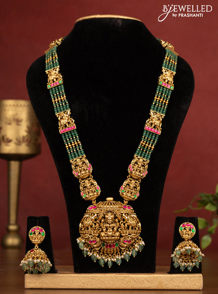 Antique beaded green necklace lakshmi pendant with pink kemp stones and pearl & green beads hanging