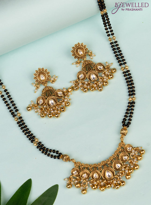 Mangalsutra double layer with kundan stones and pearl & golden beads hanging