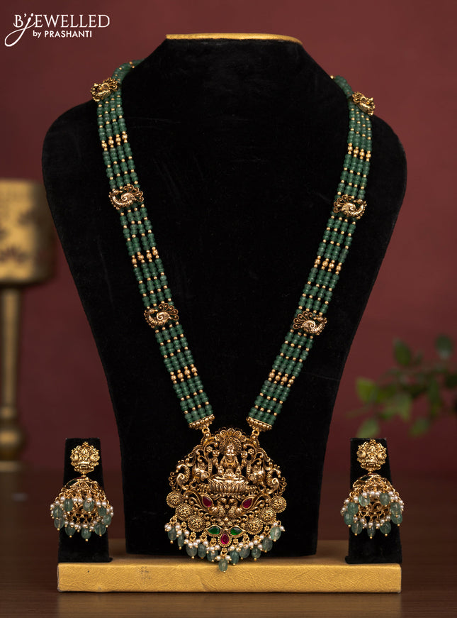 Jadau beaded haaram lakshmi pendant with jadau kemp stones and pearl & green beads hanging
