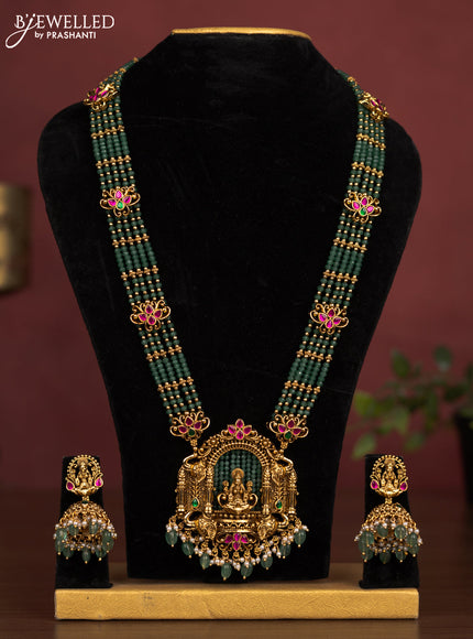 Jadau beaded haaram lakshmi pendant with jadau kemp stones and pearl & green beads hanging