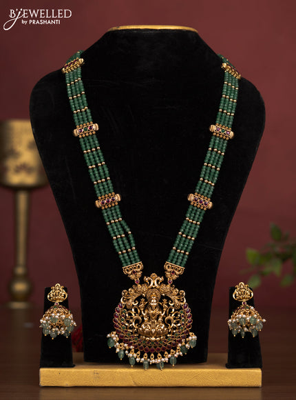 Antique beaded haaram lakshmi pendant with kemp stones and pearl & green beads hanging