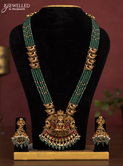 Jadau beaded haaram lakshmi pendant with jadau kemp stones and pearl & green beads hanging
