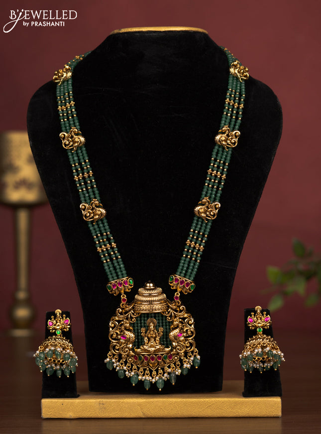 Jadau beaded haaram lakshmi pendant with jadau kemp stones and pearl & green beads hanging