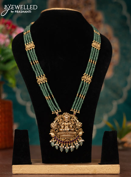 Antique beade haaram lakshmi pendant with pink kemp stones and pearl & golden beads hanging