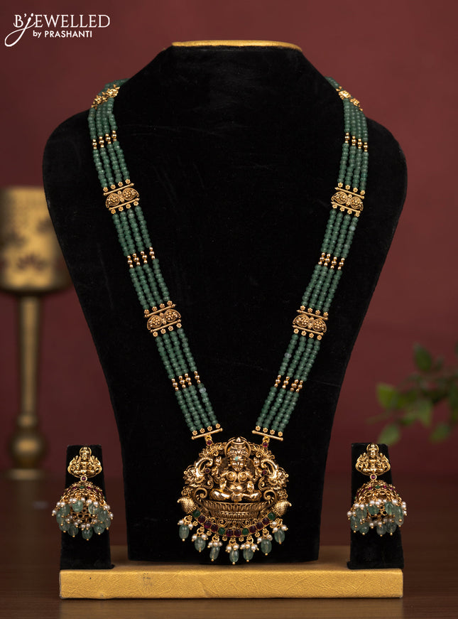 Antique beade haaram lakshmi pendant with kemp stones and pearl & golden beads hanging