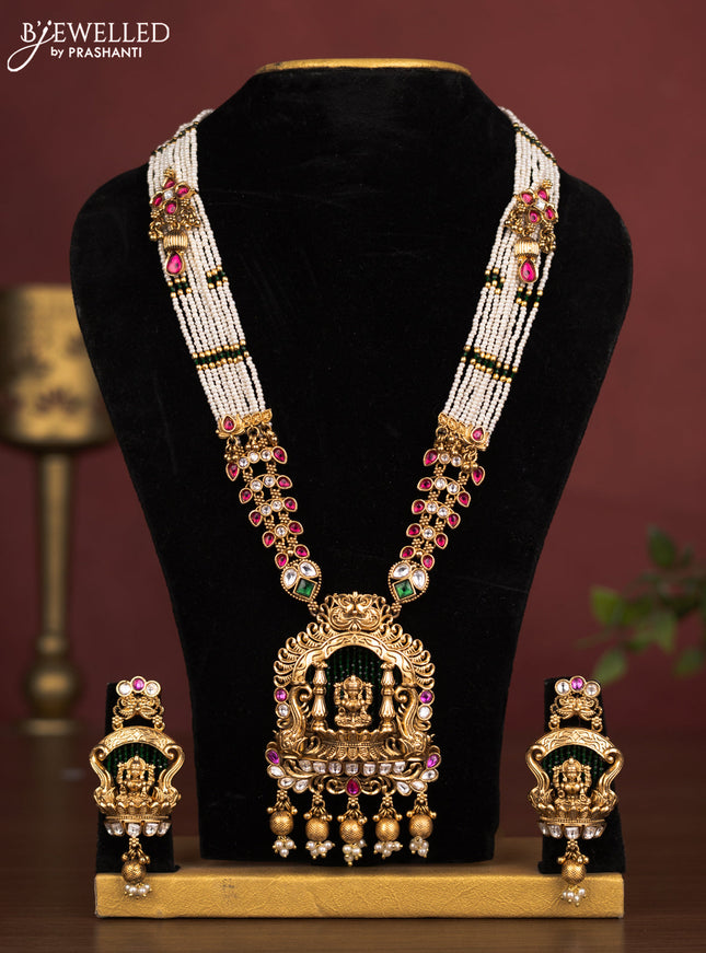 Jadau beaded haaram lakshmi pendant with jadau kundan stones and pearl & golden beads hanging