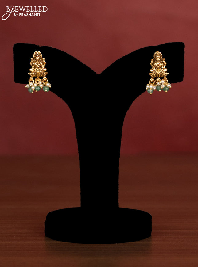 Antique beaded necklace lakshmi pendant with kundan stones and pearl & green beads hanging