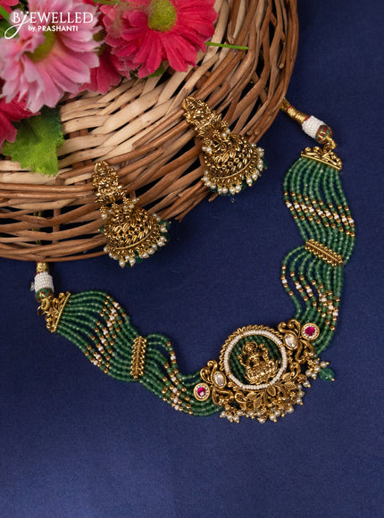 Jadau beaded choker lakshmi pendant with jadau kundan stones and pearl & green beads hanging
