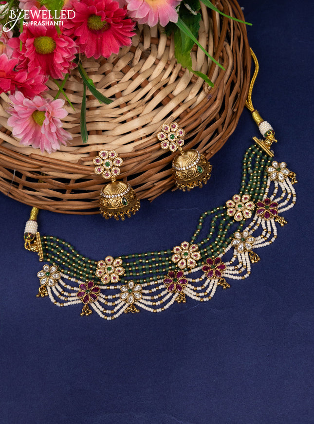 Jadau beaded choker floral design with jadau kundan stones and golden beads hanging