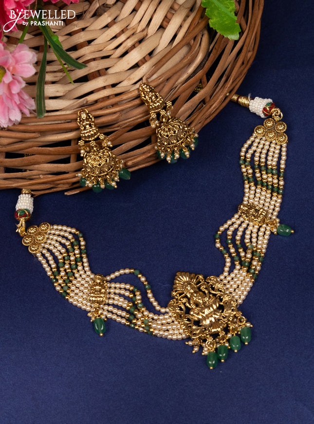 Antique beaded choker with lakshmi pendant and pearl & green beads hanging