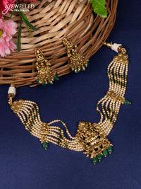 Antique beaded choker with lakshmi pendant and pearl & green beads hanging