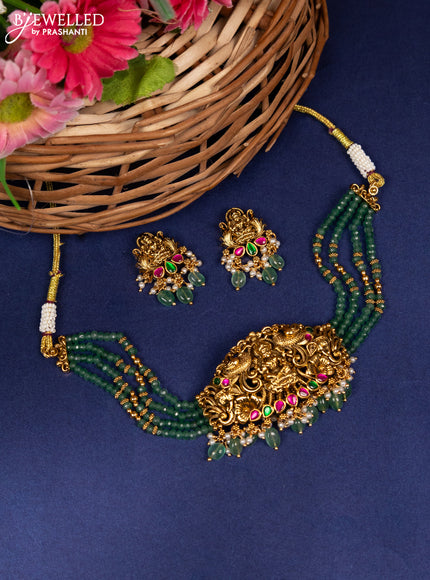 Jadau beaded choker lakshmi pendant with jadau stones and pearl & green beads hanging