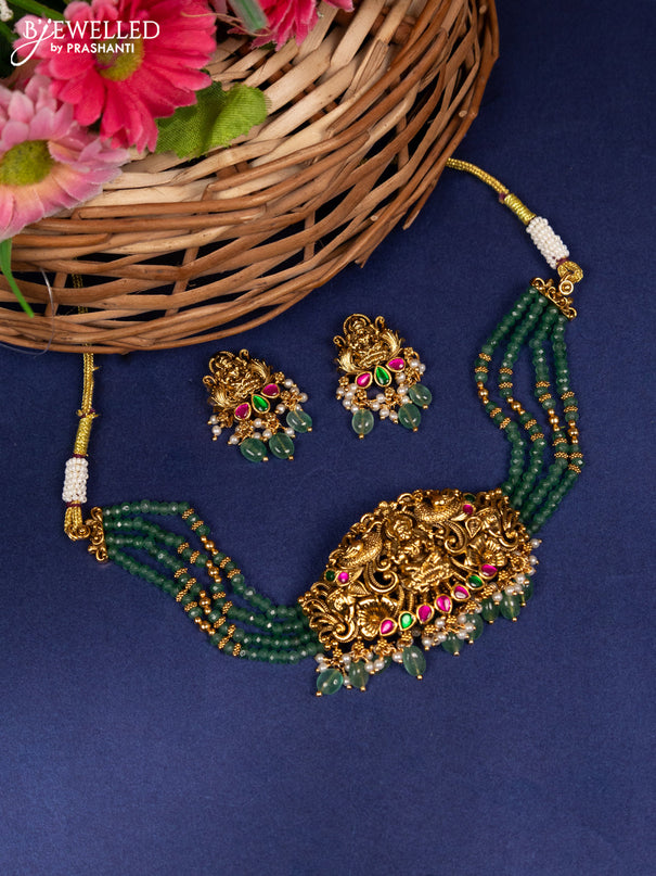 Beaded choker lakshmi pendant with jadau stones and pearl & green beads hanging