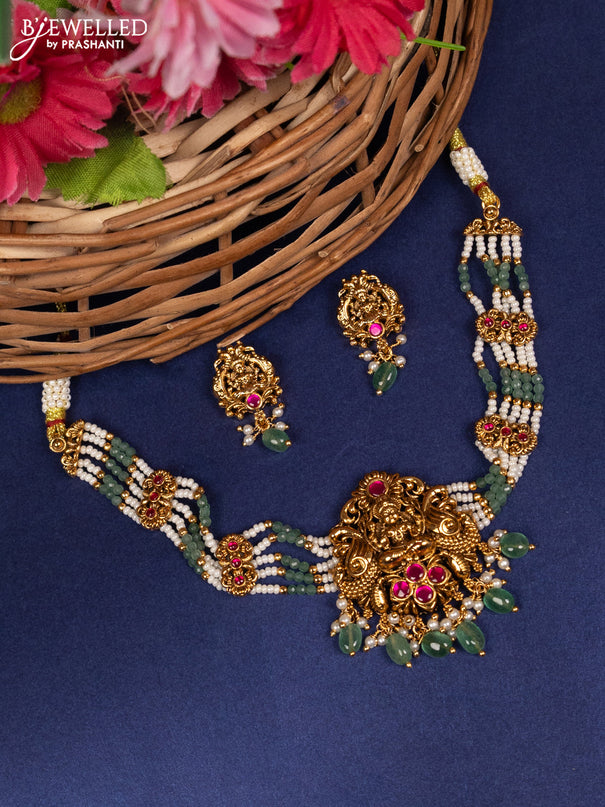 Beaded choker lakshmi pendant with pink jadau stones and pearl & green beads hanging