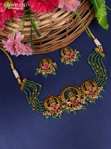 Jadau beaded choker lakshmi pendant with pink jadau stones and pearl & green beads hanging