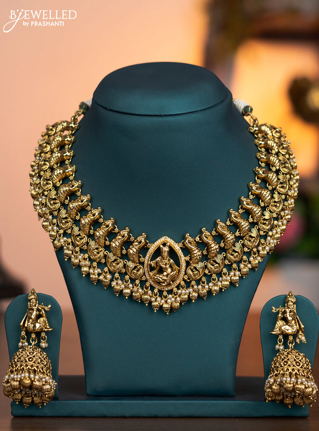 Antique necklace krishna & pecock design with cz stones and pearl & golden beads hanging