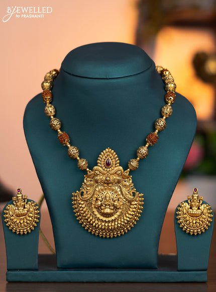 Antique rudhraksha mala with lakshmi pendant and pink kemp stone