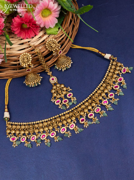 Jadau choker lakshmi design with pink jadau kundan stones and pear & golden beads hanging with maang tikka