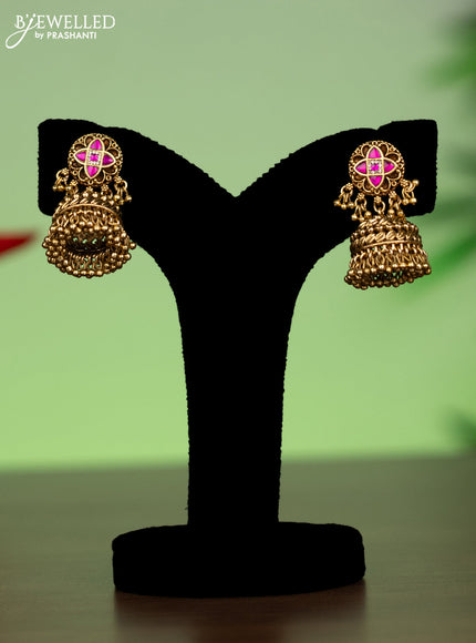 Jadau attigai necklace with pink jadau stones and golden beads hanging