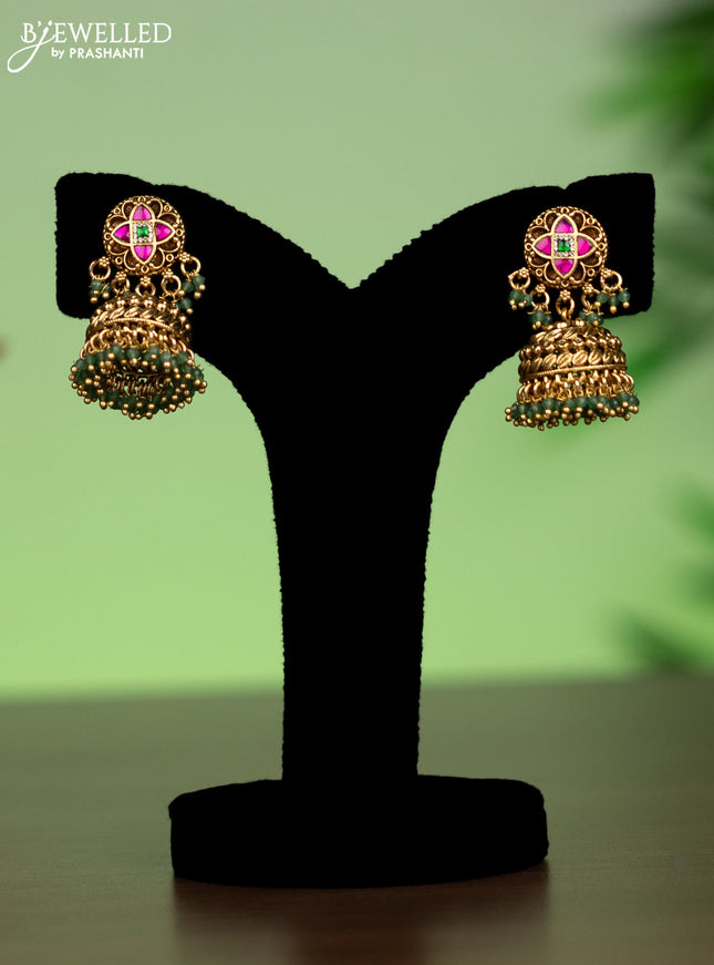 Jadau attigai necklace with jadau stones and green beads hanging