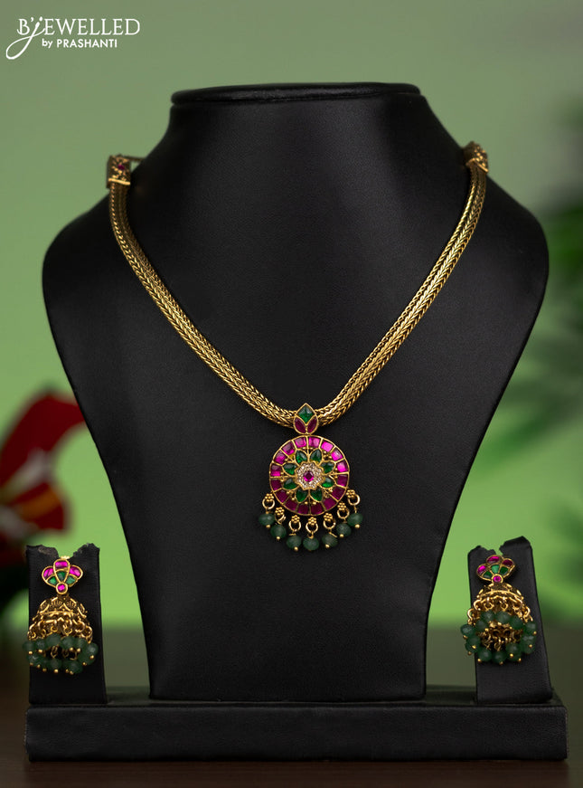 Jadau attigai necklace with jadau stones and green beads hanging