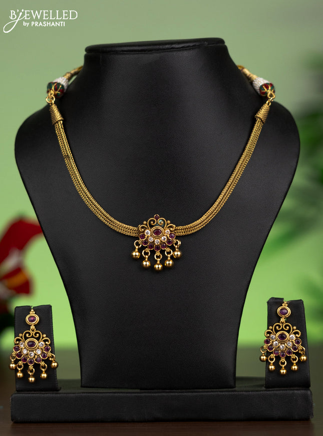 Antique attigai necklace with pink kemp & kundan stones and golden beads hanging