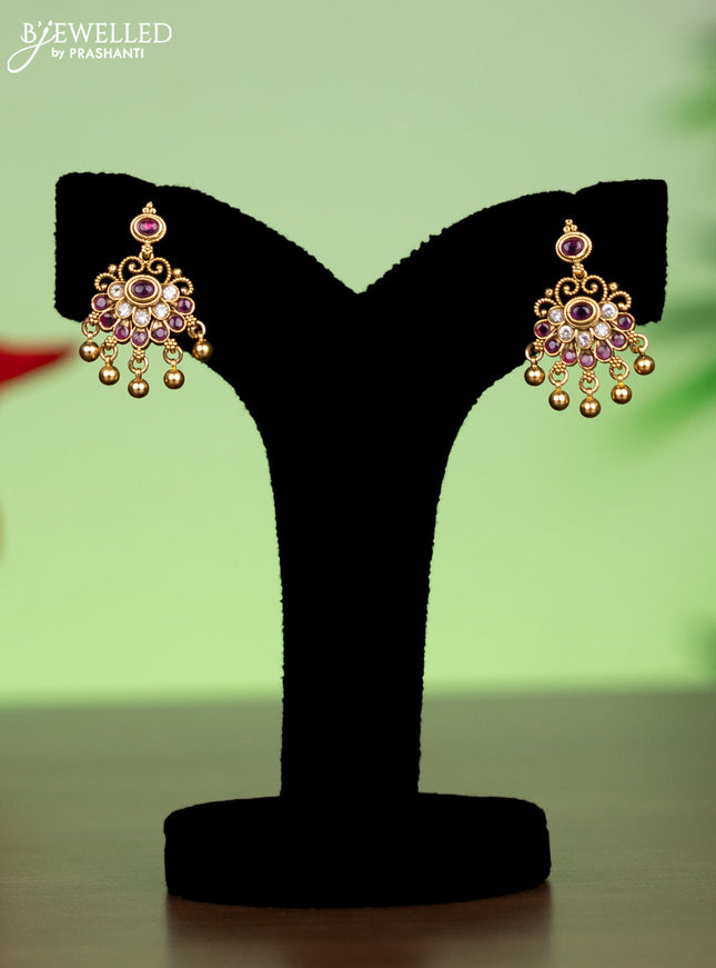 Antique attigai necklace with pink kemp & kundan stones and golden beads hanging