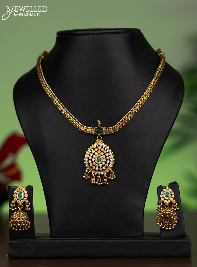 Jadau attigai necklace with green jadau & cz stones and golden beads hanging
