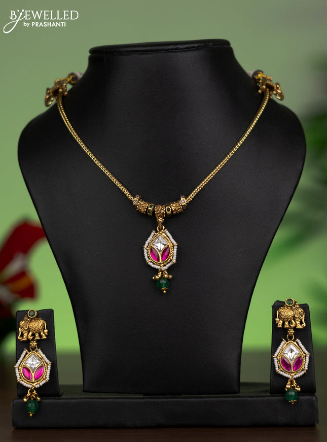 Antique attigai necklace elephant design with pink kemp & kundan stones and green beads hanging