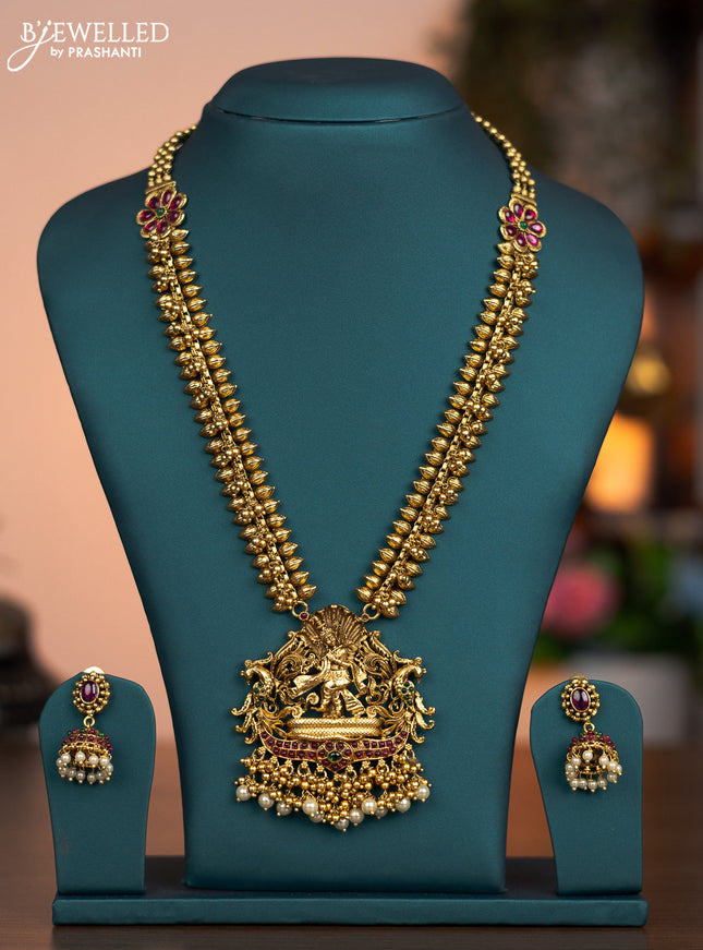 Antique haaram krishna pendant with kemp stone and pearl & golden beads hanging