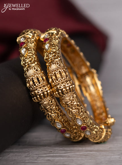 Antique screw type bangle with pink kemp and kundan stones
