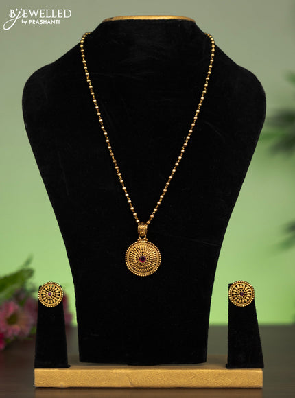 Antique chain with simple design and pink kemp stone