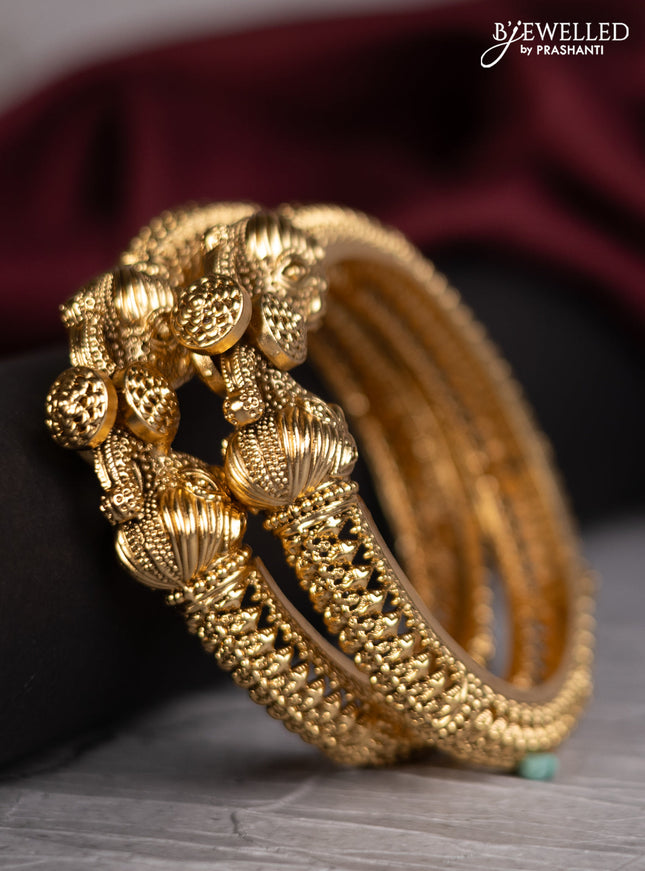 Antique screw type bangles with elephant design
