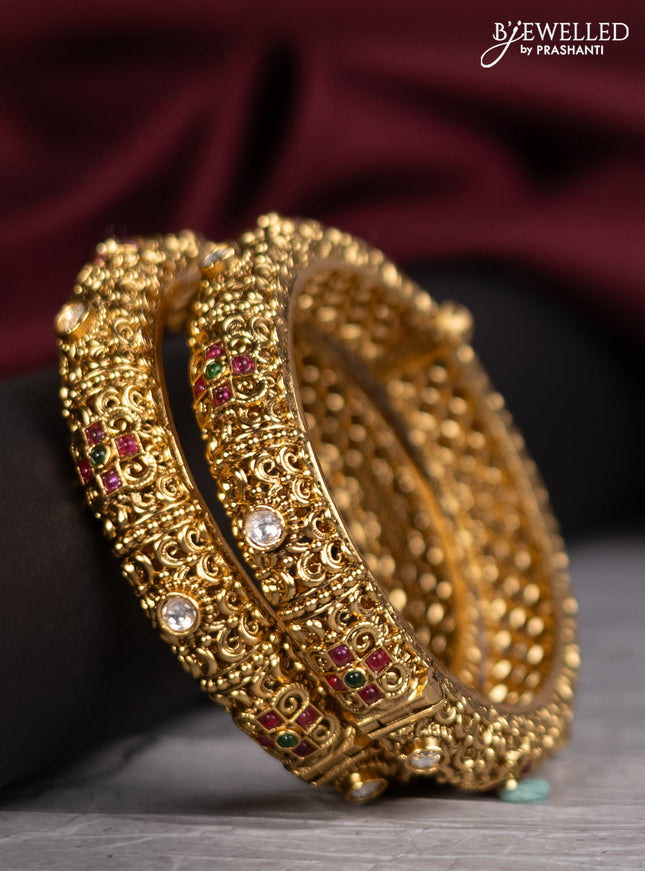 Antique screw type bangles with kemp and kundan stones