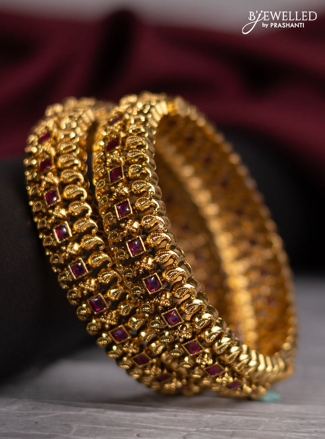 Antique screw type bangles with ruby stones