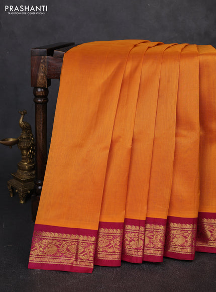 Silk cotton saree mustard yellow and deep wine shade with plain body and zari woven korvai border