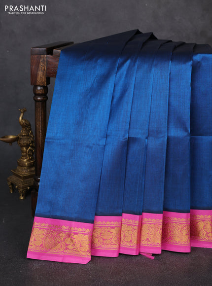 Silk cotton saree peacock blue and pink with plain body and zari woven korvai border