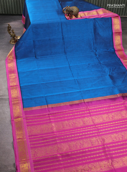 Silk cotton saree peacock blue and pink with plain body and zari woven korvai border
