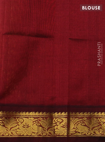 Silk cotton saree yellow and deep maroon with plain body and zari woven korvai border