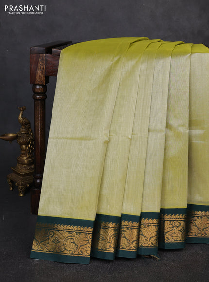 Silk cotton saree pista green and bottle green with plain body and zari woven korvai border
