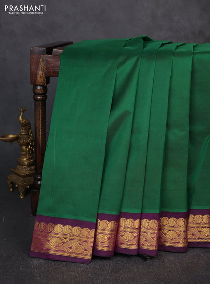 Silk cotton saree green and pink with plain body and zari woven korvai border
