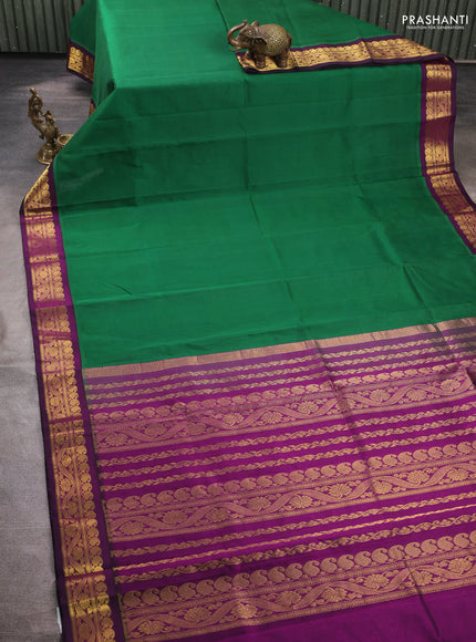 Silk cotton saree green and pink with plain body and zari woven korvai border