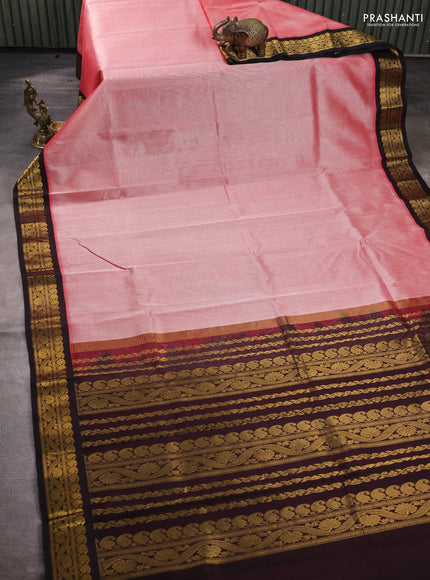 Silk cotton saree red shade and coffee brown with plain body and zari woven korvai border