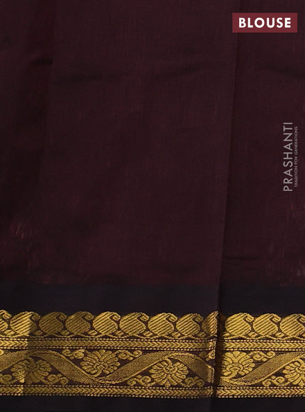 Silk cotton saree red shade and coffee brown with plain body and zari woven korvai border