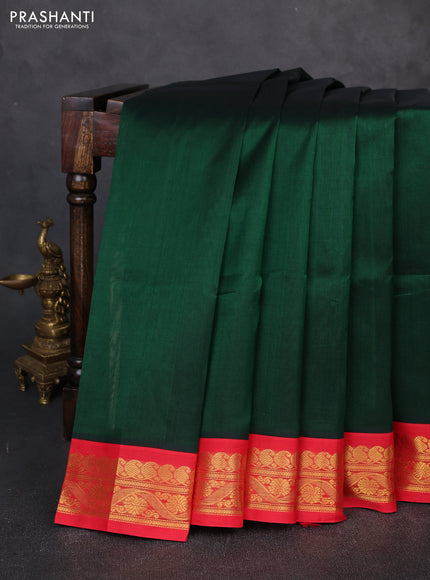 Silk cotton saree bottle green and red with plain body and zari woven korvai border