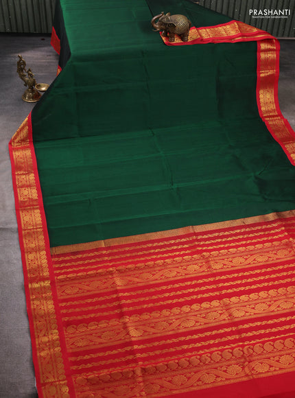 Silk cotton saree bottle green and red with plain body and zari woven korvai border