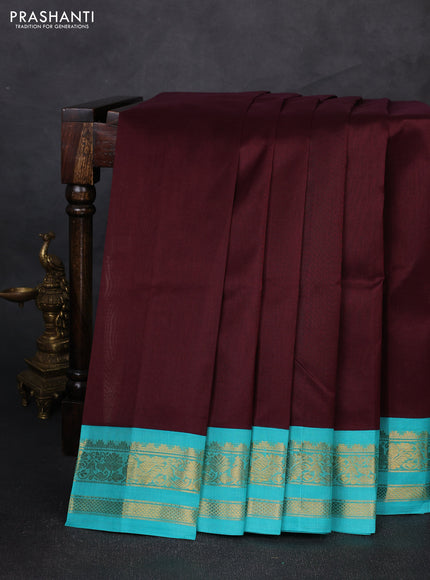 Silk cotton saree coffee brown and teal blue with plain body and zari woven korvai border