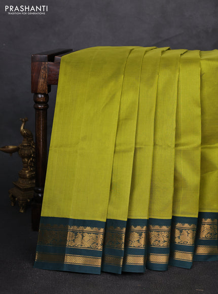 Silk cotton saree mehendi green and bottle green with plain body and zari woven korvai border