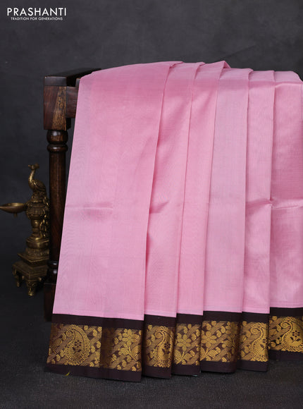 Silk cotton saree pastel pink and coffee brown with plain body and zari woven korvai border